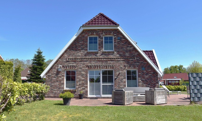 Neßmersiel Maison | Dream vacation home NordseeStar with fireplace and lounge in Neßmersiel