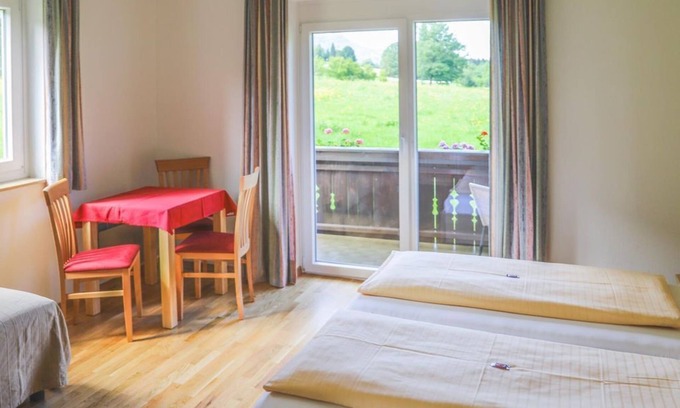 Rappitsch Lit Et Petit-Déjeuner | Dreibettzimmer mit Balkon und Seeblick - Pension Strauß