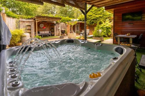 Erm Chalet De Ski | Drents Genieten - Ericaheide met privé sauna en jacuzzi