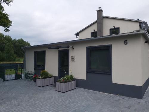 Muritz Maison | Ecki's Ferienhaus "KOMM an de BÄK" mit 5 Sternen bewertet bei Google und Traumferienwohnungen