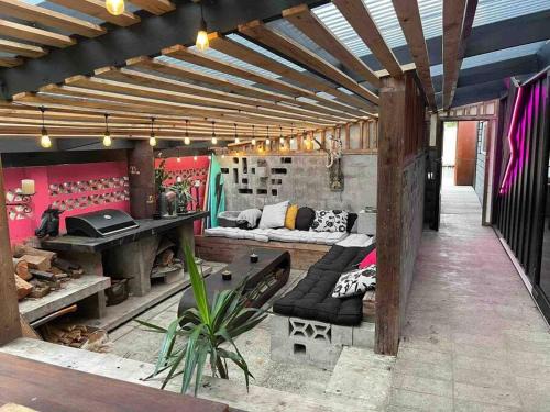 Bowentown Maison | Electric Waihi Beach House - family & dog friendly, close to beach, pool table, outdoor fire room, skate ramp