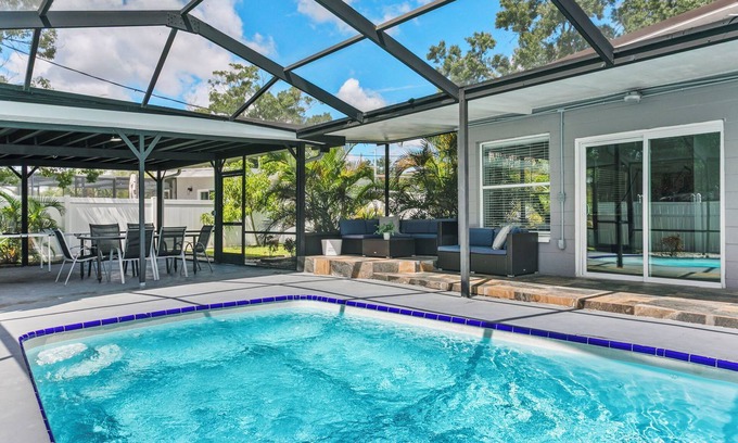 Tampa Maison | Elegant 4BR Family Retreat with Heated Pool This beautifully appointed home offers 4 spacious bedrooms, 2 modern bathrooms, AC, private pool and sleeps up to 10 guests in total comfort.