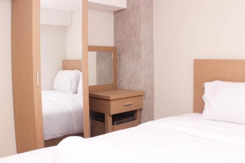 Jakarta Appartement | Elegant and Strategic Loft Studio Apple 1 Condovilla Apartment By Travelio