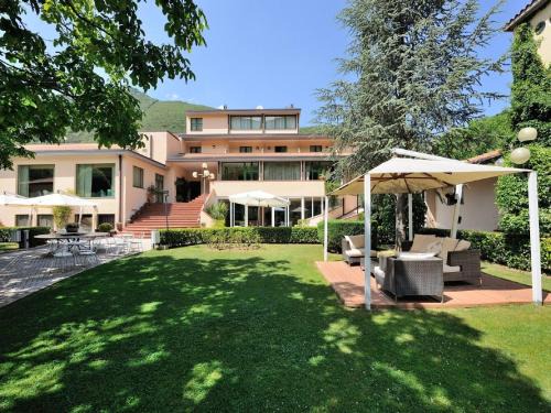 Foligno Maison | Elegant apartment in resort with swimming pool featuring nature and tranquillity