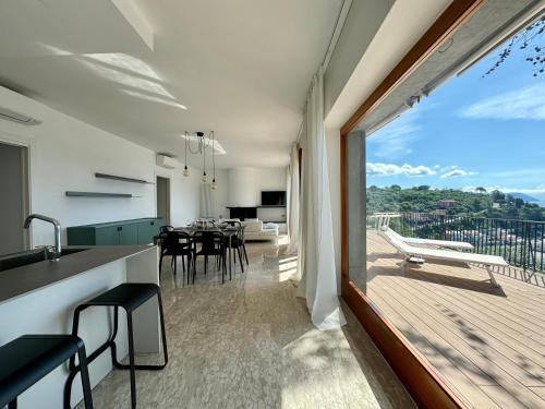Portovenere Appartement | Elegant modern and bright flat with splendid terrace overlooking the sea and Palmaria Island Modern designer interior accommodates up to six people
