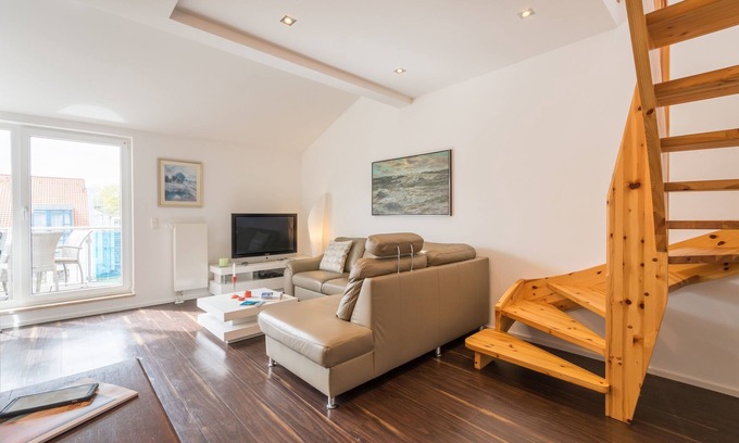 Juliusruh Appartement | Elegant vacation apartment with south-facing balcony, 100 m to the beach