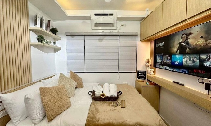 Alabang Copropriété | Elite Escapes/staycation in Alabang with High speed WIFI up to 200mbps +Netflix