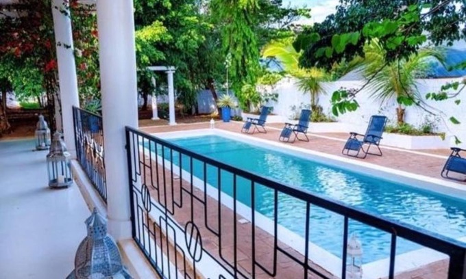 Moshi Villa | En-Suite family room in Amans Luxury Villa with private pool