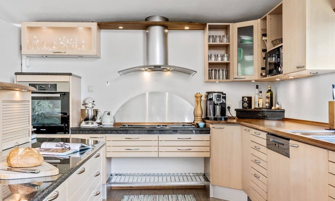 Daugard Maison | Enjoy a relaxing holiday in this holiday home with sea views near Vejle Fjord.