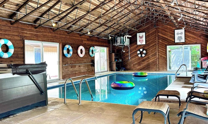 Rockford Maison | Entertainment Oasis Indoor Pool Spa Arcade Theatre