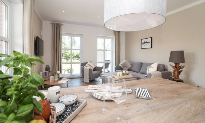 Greetsiel Appartement | Entspannung Pur: Moderne Ferienwohnung 'viel Meer' mit Sauna und Garten