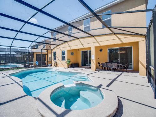 Watersong Maison | Epic 6-Bedroom Escape - Private Theater, Game Room, Pool, Spa & Themed Fun in Resort-Style Comfort