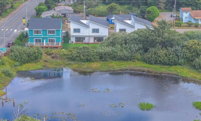 Rockaway Beach Maison | Escape to a cozy, modern lake house with beautiful Oregon views.