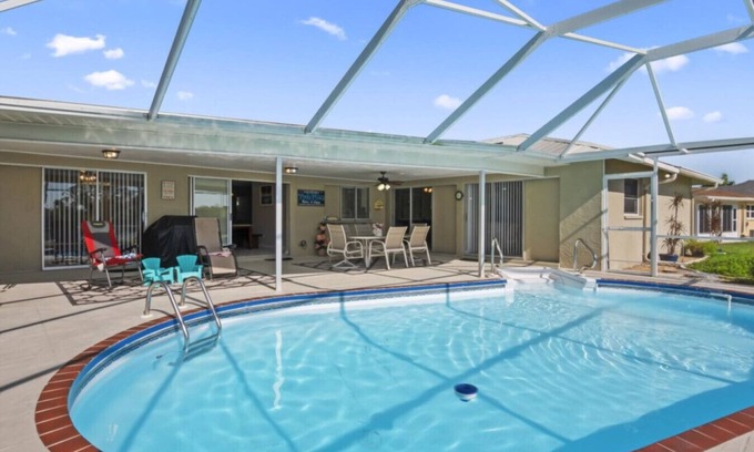 Caloosahatchee Maison | Escape to this charming 3-bedroom house in Cape Coral