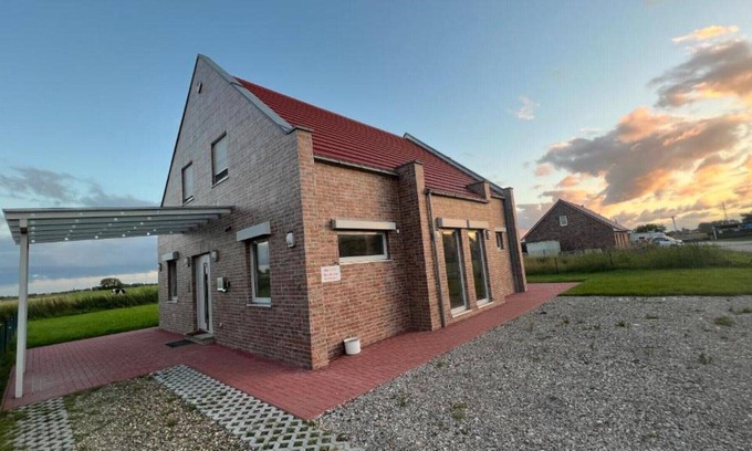 Eilsum Appartement | Exklusiver Platztraum, Sonnengeflutet, mit Weitblick Garten, Südbalkon/terrasse
