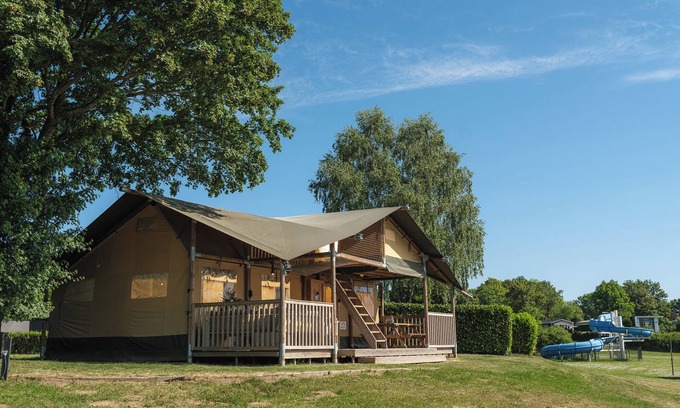 Lathum Maison | Experience luxury glamping in the elevated Safari Tent Ranger by the water.