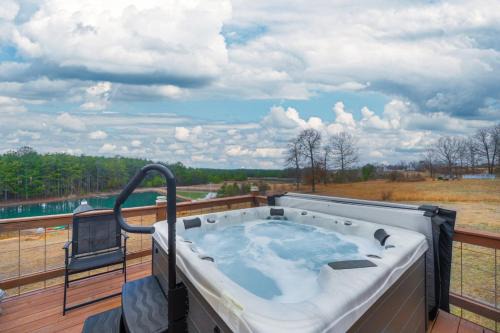 Bryant Maison | Fall Foliage Retreat Hot Tub and Pond Deck