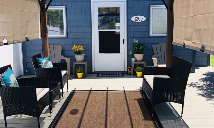 North End Maison | Cour XL entièrement clôturée pour les familles avec pergola et barPicnicArea et douche extérieure!