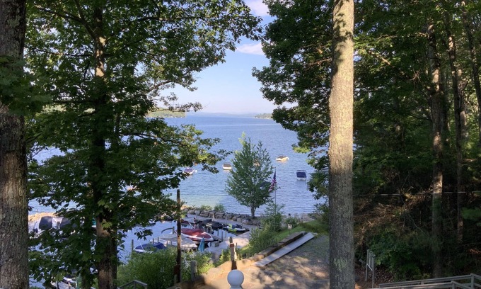 Wolfeboro Maison | Family Friendly house with lakefront views surrounded by trees