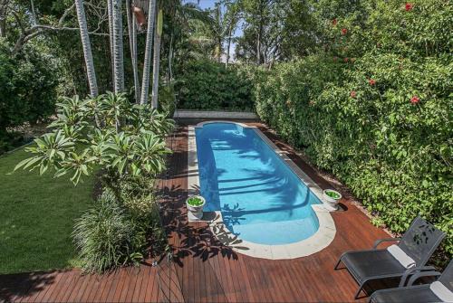 Wooloowin Maison | Family Friendly, Pool, 9km to City by Custom Bnb Hosting