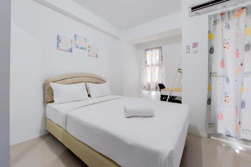 South Tangerang Appartement | Fancy and Nice Studio at Urbantown Serpong Apartment By Travelio
