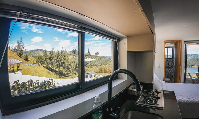 Guatape Maison | FARM BETWEEN PEÑOL AND GUATAPE. 3 JACUZZI AND 5 COMMON AREAS. AND SPECTACULAR VIEW.