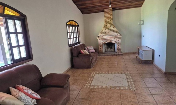 Mato do Gado Maison | Farm with swimming pool, fireplace and gourmet space surrounded by greenery.