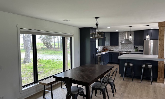 Howell Maison | Farmhouse in McCrory, Arkansas on 5 acres is a cozy retreat. Witness the Eclipse