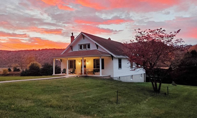 Romney Maison | New Listing! Farmhouse along River Rd. with idyllic views and country charm