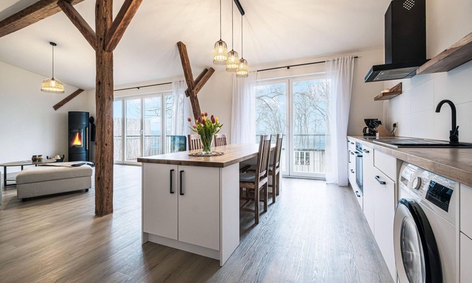 Steinbergkirche Appartement | Favorite place by the sea - east barn on Mühlendamm with sea view, stove and sauna