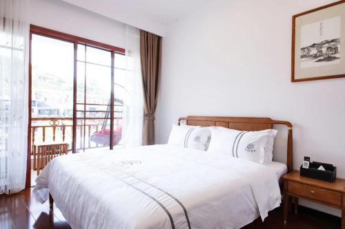 Gannan Tibetan Hôtel | fenghuang riverside house