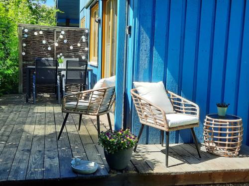 Bremke Maison | Ferienhaus "Auszeit mit Herz" im Ferienpark Extertal - Kamin, Fass-Sauna, Massagesessel