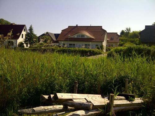 Seedorf Appartement | Ferienhaus Boddenkiek mit Wasserblick in Seedorf