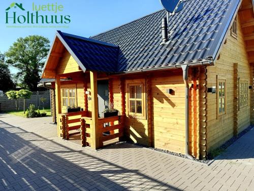 Augustfehn Maison | Ferienhaus "luettje Holthuus"