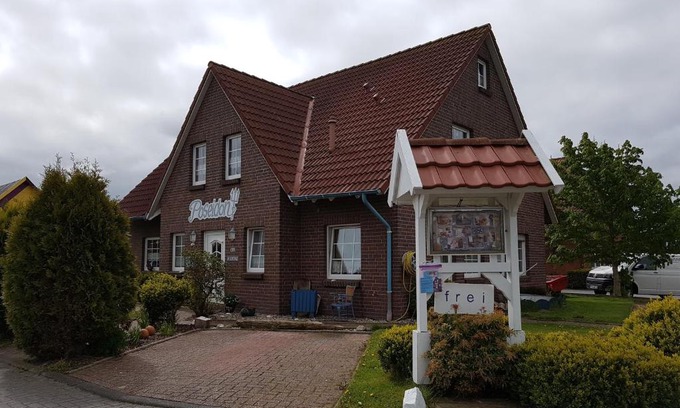 Neuharlingersiel Appartement | Ferienhaus Poseidon