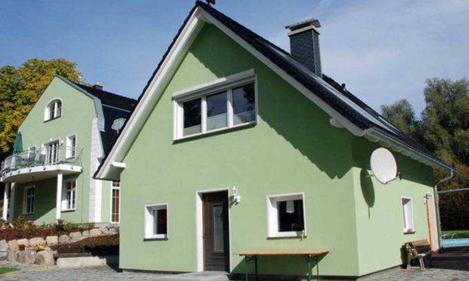 Rugen Island Appartement | Maison de vacances arc en ciel avec cheminée et terrasse - appartements de manoir avec cheminée, sauna et piscine extérieure
