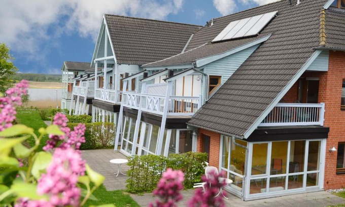 Neuensien Appartement | Ferienwohnung 15 im Fischerhaus mit Balkon