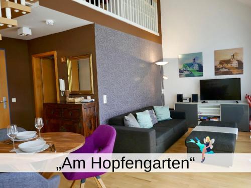 Enzisweiler Appartement | Ferienwohnung am Hopfengarten - helle 2 Zimmer Maisonette mit großem Balkon