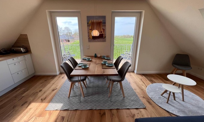 Neßmersiel Appartement | Ferienwohnung Hafenblick