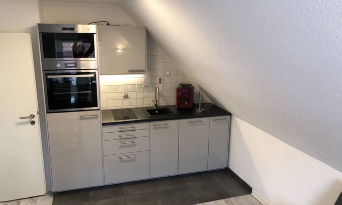Neßmersiel Appartement | Ferienwohnung im Obergeschoß in Neßmersiel Ruhig und Zentral Gelegen