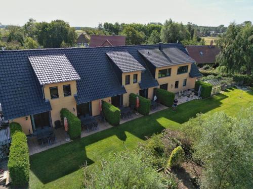 Sagard Maison | Ferienwohnung im Reihenhaus Petermann 5