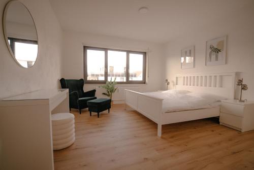 Harleshausen Appartement | Ferienwohnung Kassel mit Ladesäule & Balkon