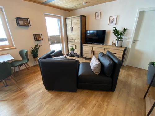 Oy Appartement | Ferienwohnung mit eigenem Garten und Bergblick