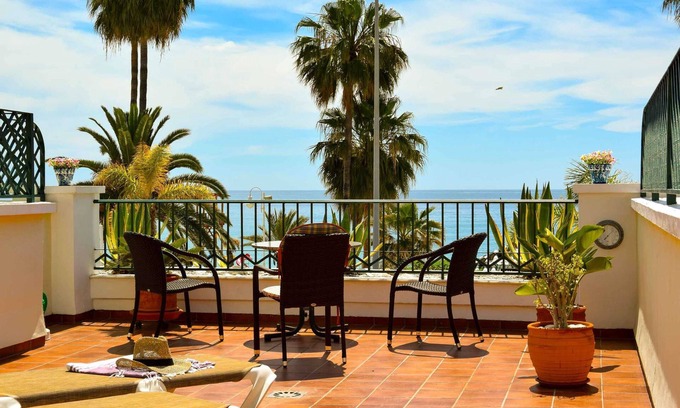 Nerja Appartement | First line of beach, comfortable apartment overlooking Playa Burriana bay