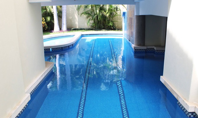 Crucecita Maison | Maison de vacances avec cinq chambres et piscine