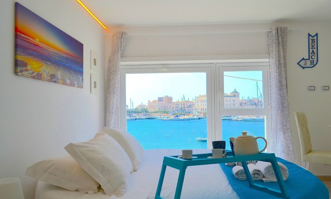 Santa Lucia Appartement | Flamingo Spa loft - Bord de mer - vue sur mer et Ortigia - wifi fibre - jacuzzi