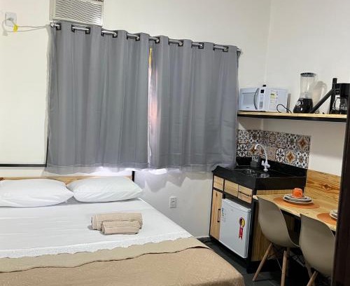 Jardim Ipe Appartement | Flat com ar e varanda com linda vista para o Ibituruna - Vôo Livre 203