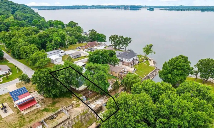Moodys Maison | Forget your worries in this spacious and serene lake house in the woods