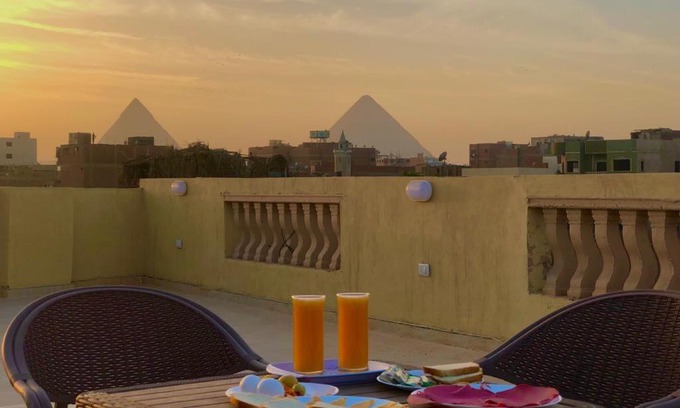 Oula Maison | Four pyramids inn