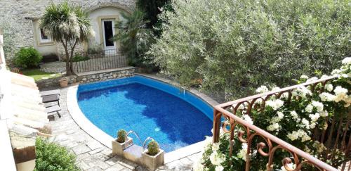 Saint-Genies-de-Malgoires Maison | Gîte familial 6 personnes climatisé, piscine partagée chauffée, proche Nîmes, Uzès, Pont du Gard, Cévennes